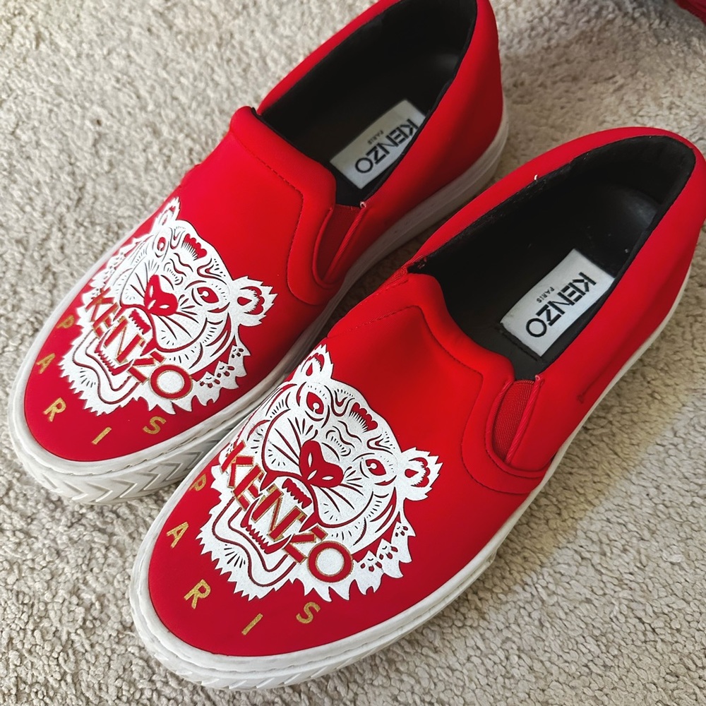 A red slip on sneakers